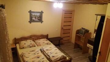 Фото номера Стандартный трехместный номер Гостевой дом Guest House Mandrivnyi г. Ясиня 11